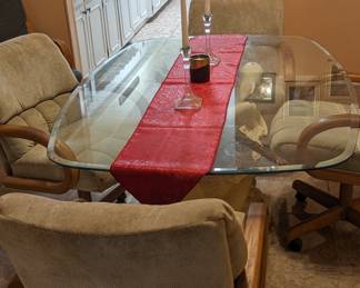 Glass dining room table with dolphin base 