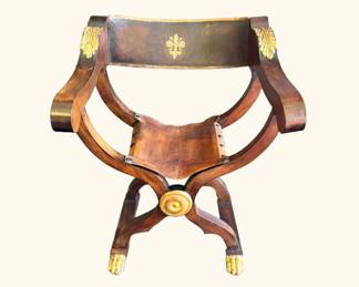 Antique Roman folding chair with leather seat and back