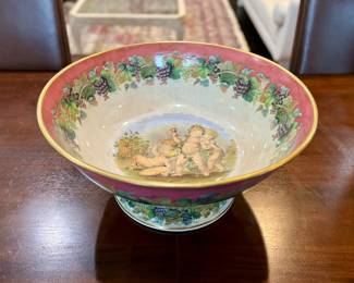 Large Italian footed bowl with grapevines and cherubs
