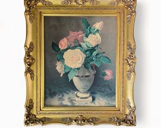 Floral arrangement in gold frame