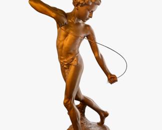 Painted metal statue - original most likely was holding a bow and arrow