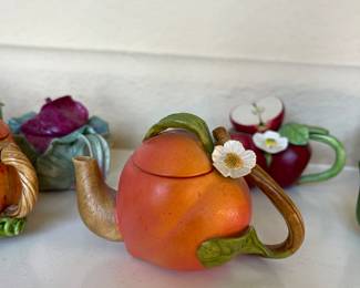 tiny teapots - about 30