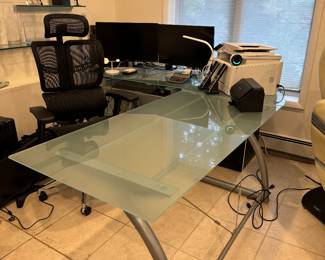 L shaped Frosted Glass and Metal Desk.  We have two