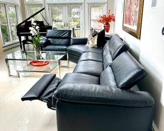 Five piece black Natuzzi, sectional with power, headrest and power recline. 2 sectionals available