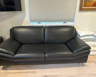 Mid modern style black, two seater leather sofa