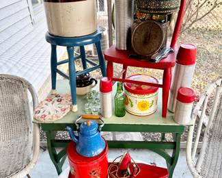 Cute porch furniture, thermoses & enamel bathtub.