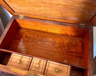 Antique small desk with turned legs.