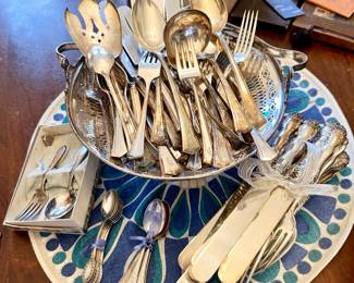 Silver-plate flatware.