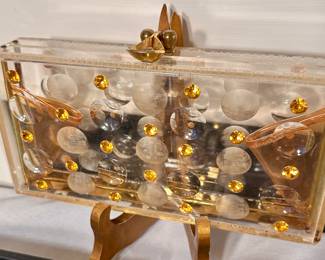 Vintage lucite and rhinestone clutch bag.