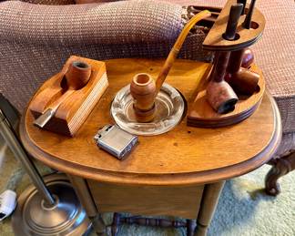 Smoking table with pipes.