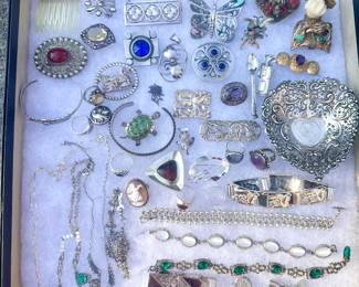 Assortment of sterling silver jewelry including Georg Jensen and N.E. From.