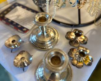 Weighted sterling candlesticks and MCM Danish candle holders.