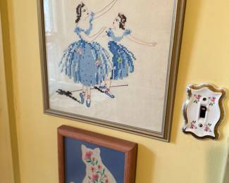 A couple of the many vintage needlework pictures.