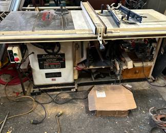 Delta Unisaw 10" titling Arbor Saw in excellent working condition (custom built includes router)