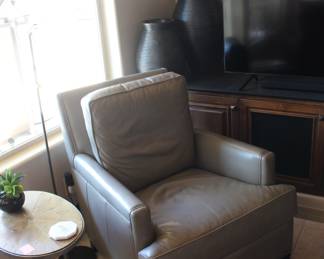 Gray contemporary recliner in leather - matching sofa