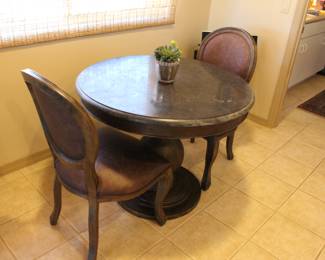 Round bistro table with granite table top and like new chairs