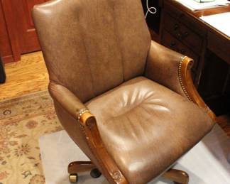 Leather and wood studded chair