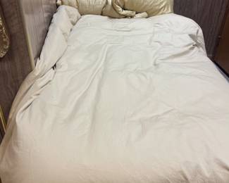 Twin bed with bookcase header.