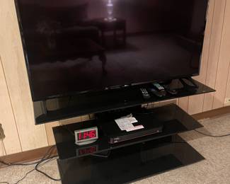 55 inch tv 
Tv stand