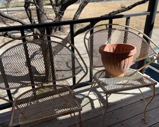 Four right iron vintage garden clam chairs