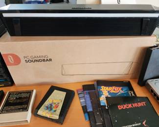 1. PC Gaming Sound Bar 2. ZAXXON SEGA Atari 2600 Game Cartridge 3. QBert Atari 2600 Game Cartridge