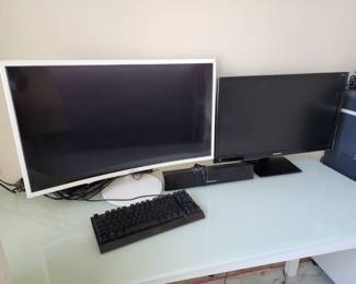 1. Samsung Curved Monitor - White 2. Samsung S27E310H - 27 in Screen/1ms Response Time
