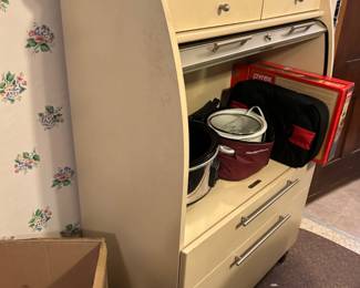 Awesome rolling storage cabinet with roll-top closure