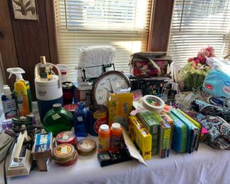 Cleaning supplies, toys, household items, an awesome reverse display clock, apple corer