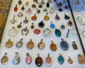 SEVERAL STERLING SILVER PENDANTS 