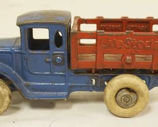 1241 ANTIQUE CAST IRON TOY STAKE BODY LIVESTOCK TRUCK, APPROXIMATELY 9 IN X 3 3/4 IN H