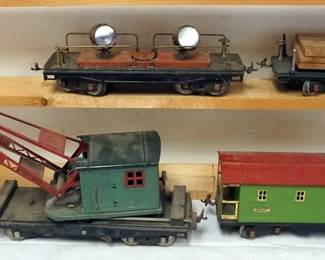 1186 LIONEL STANDARD GAUGE TRAIN CARS, #219 CRANE, #220 SEARCH LIGHT, #511 FLAT BE, #517 CABOOSE