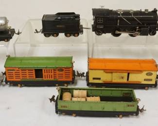 1082 LIONEL TRAIN O GAUGE #261E LOCOMOTIVE WITH TENDER WITH 7 CARS. #815, TANKER, SEARCH LIGHT, #812, #813 CATTLE CAR