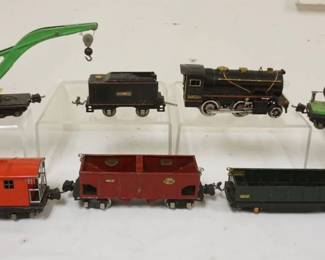 1081 LIONEL TRAIN O GAUGE #257 LOCOMOTIVE WITH #257B TENDER WITH 5 CARS. #2810 CRANE, SEARCH LIGHT CAR, #812, #816 HOPPER, #2817 CABOOSE