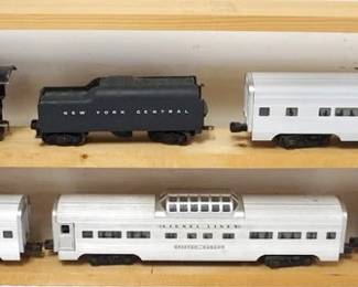 1098 LIONEL TRAIN O GAUGE #773 LOCOMOTIVE WITH NYC TENDER AND 4 SILVER CARS, SILVER CLOUD, SILVER DAWN, SILVER RANGE