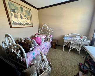 Twin iron bed, kids' wicker desk, small table