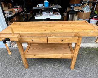 Beautiful Mid-Century Woodworking Table with handsome wood grains,  built in vises and green felt-lined drawers.