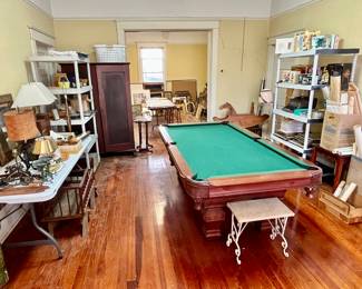 Pool Table includes cue sticks, balls and rack.