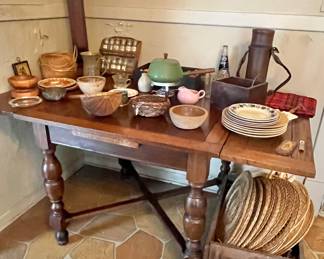 Antique English pub table loaded with antiques and primitives. 