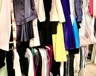 Dozens of high end ladies vintage designer clothes from the 60's, 70's & 80's. Most have been stored for decades in dry clean bags. Some still have original tags.