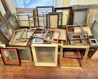 Dozens of antique picture frames!