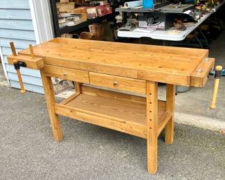 Beautiful Mid-Century Woodworking Table with handsome wood grains,  built in vises and green felt-lined drawers.