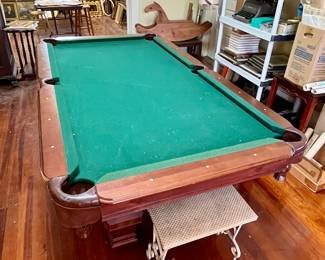Pool Table includes cue sticks, balls and rack.