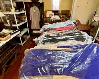 Dozens of high end ladies vintage designer clothes from the 60's, 70's & 80's. Most have been stored for decades in dry clean bags. Some still have original tags.