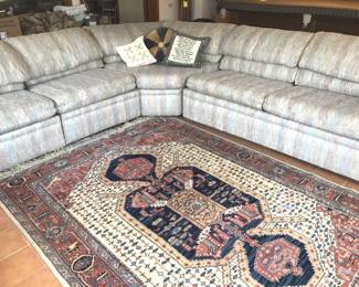 3pc. Curved sectional and rug