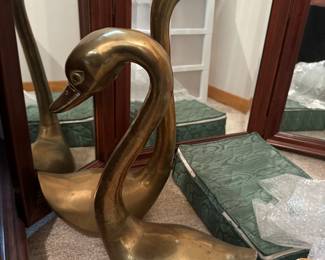 Large brass swans