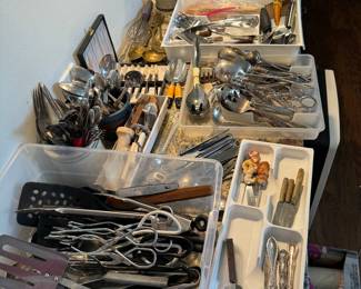 Tons of utensils and flatware