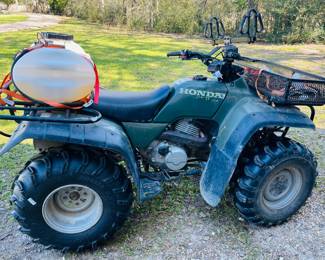 Honda Fortrax 300 Four Wheeler with Front Rack and Sprayer 
   Rear Tires are Brand New