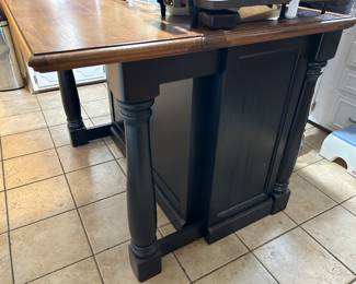 Kitchen island with leaf, drawers and cabinet 