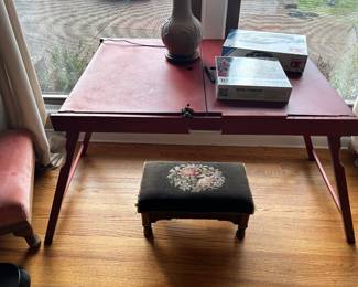 Puzzle table. Stores puzzle, folds down for easy transport and storage 