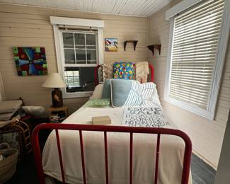 cute antique metal bed-- cant tell in the photo but it's painted red !